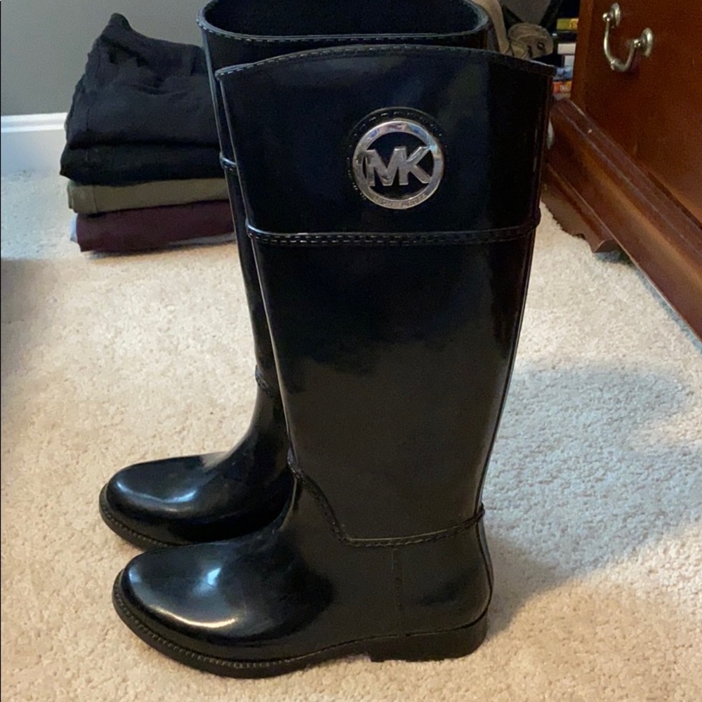 Knee high rain boots